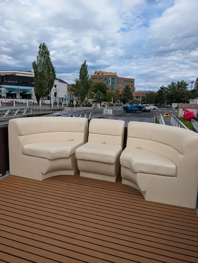 Upper sun deck lounge seating on the double decker pontoon